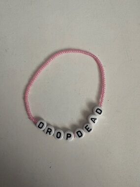 Olivia Rodrigo “drop dead” bracelet